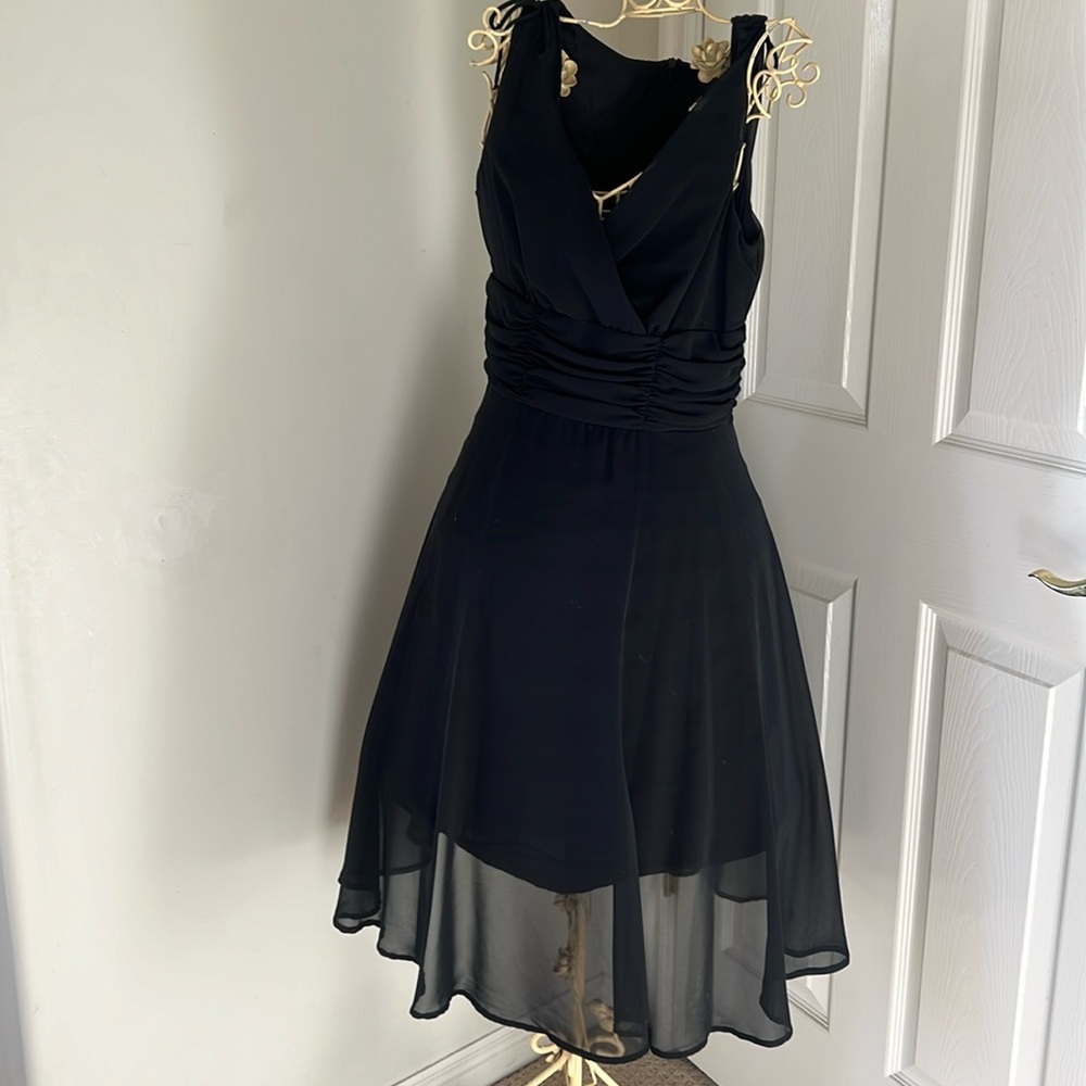 Little black dress. Perfect for the holidays. Size 4P